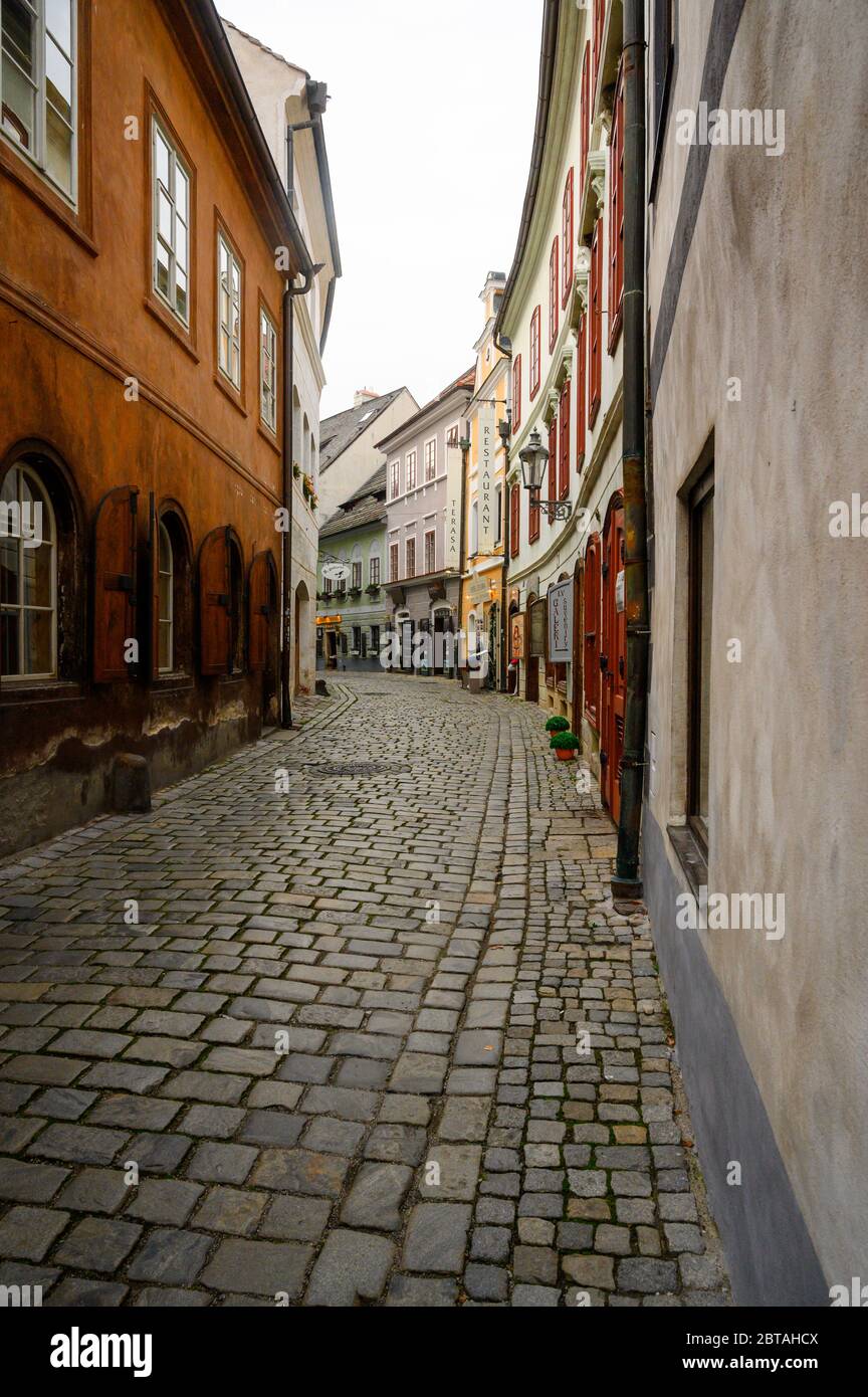 Cobblestone street / alleyway  in the old town of Cesky Kromlov in the Southern Bohemia region of the Czech Republic, Europe Stock Photo
