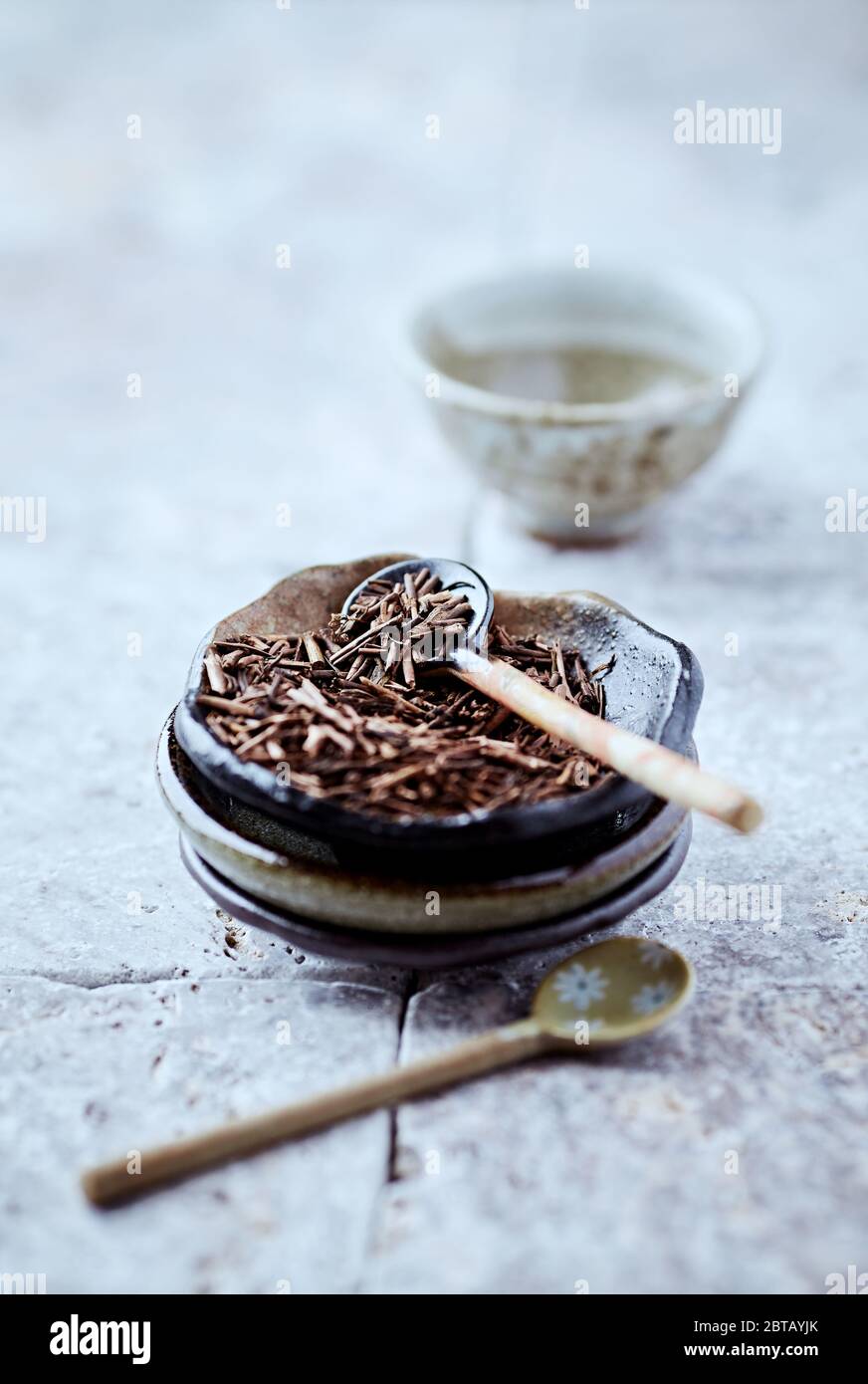 Dried Rooibos Leaves on Bright Stone Background. Close up Stock Photo Alamy
