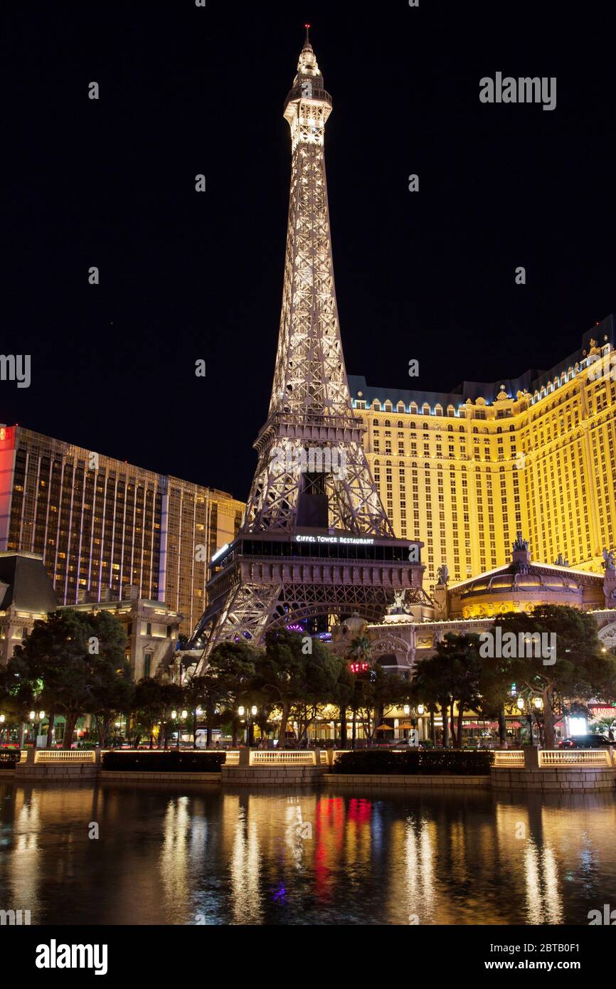 Eiffel Tower Of Paris Hotel In Las Vegas Illuminated At Night In Las Vegas,  Nevada Stock Photo, Picture and Royalty Free Image. Image 65907822.