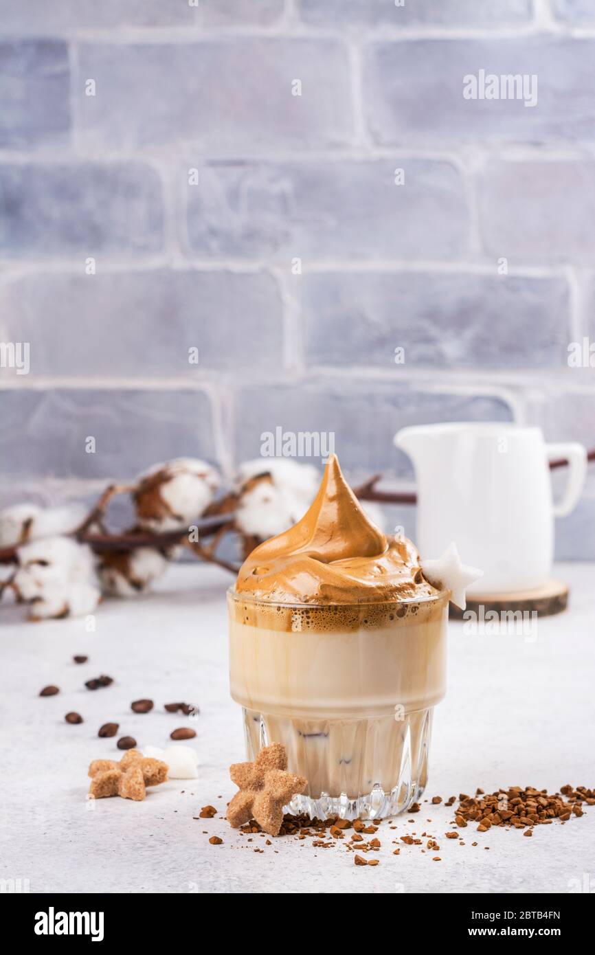 Dalgona korean coffee, trendy drink with whipped instant coffee and milk Stock Photo Alamy