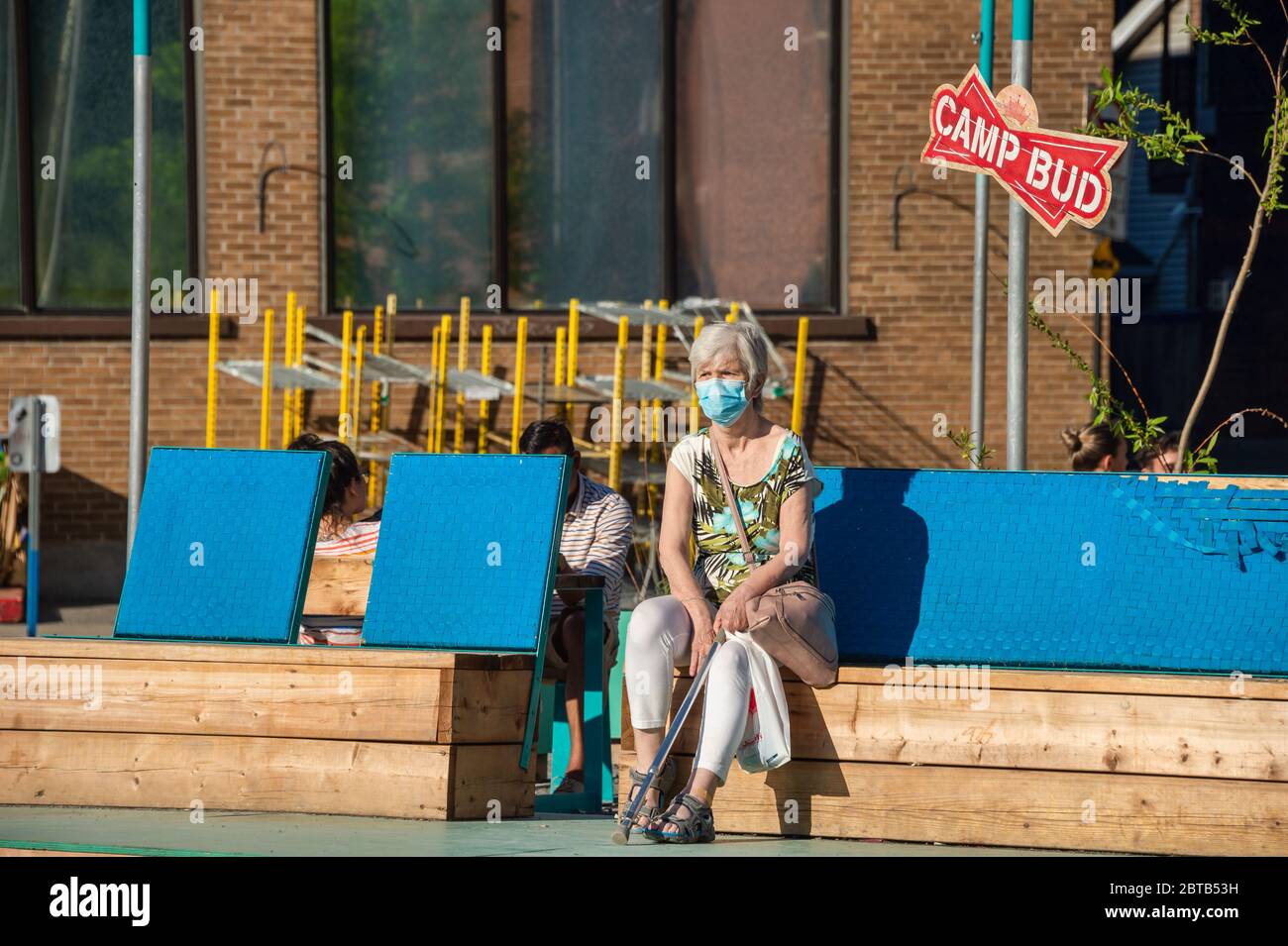 Elderly woman wearing a mask hi-res stock photography and images - Alamy