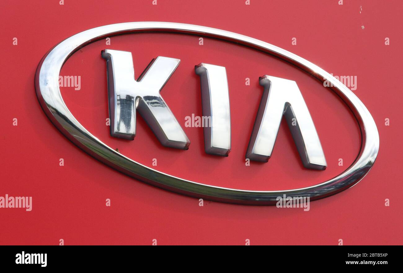Kia motor company logo seen at a car dealership Stock Photo Alamy