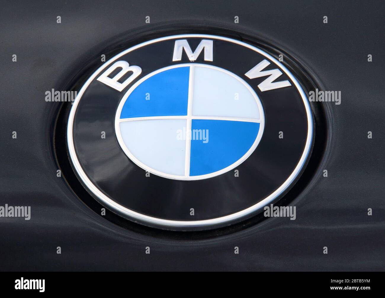BMW motor company logo seen at a car dealership Stock Photo Alamy