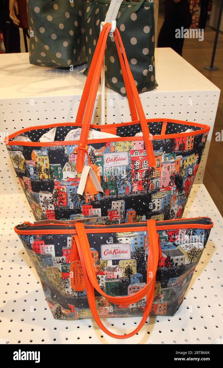 Typically colourful Cath Kidston handbags displayed in one of their  stores.More than 900 jobs are to be cut with immediate effect at retro  retail label Cath Kidston after the company said it