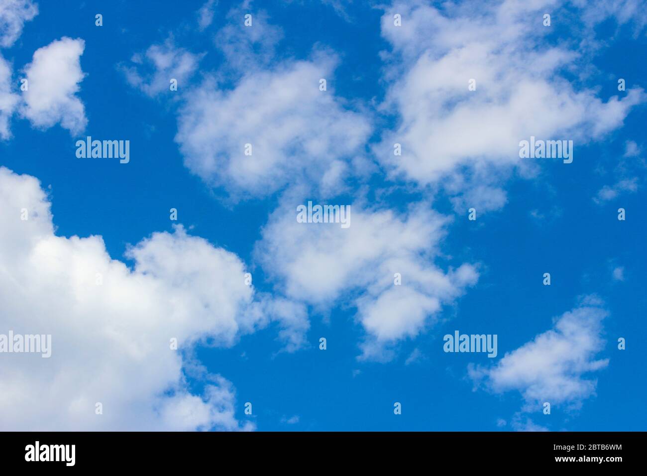 White clouds in the blue sky as background Stock Photo