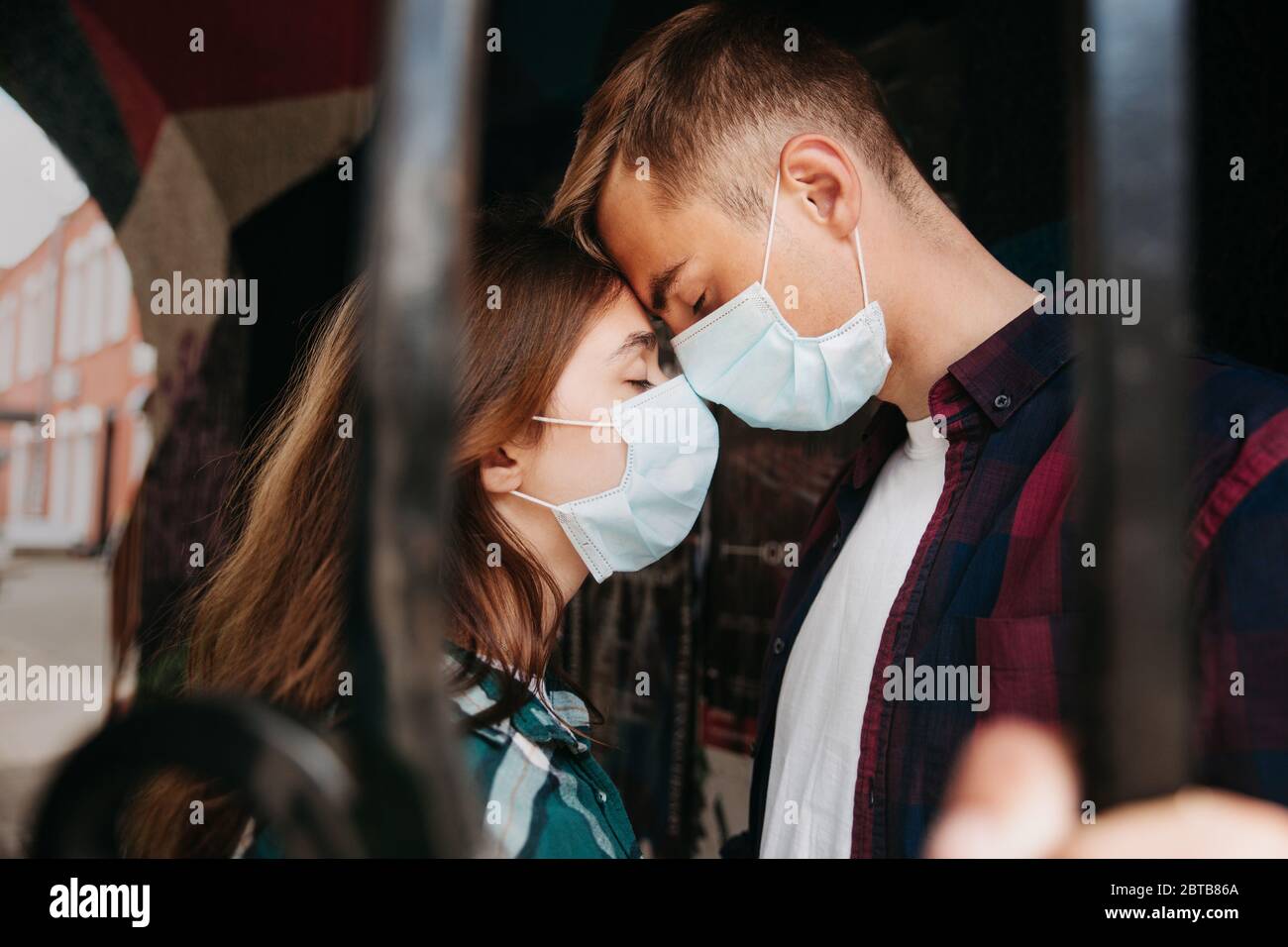 Download Couple Face Mask Home High Resolution Stock Photography And Images Alamy PSD Mockup Templates