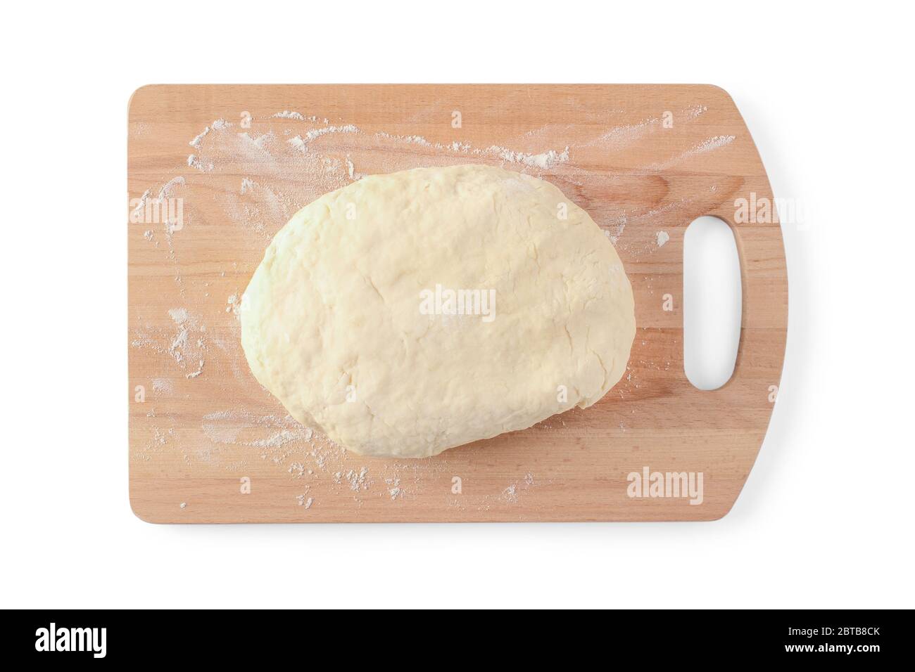Slice of dough in flour on a cutting board isolated on white. View from above Stock Photo