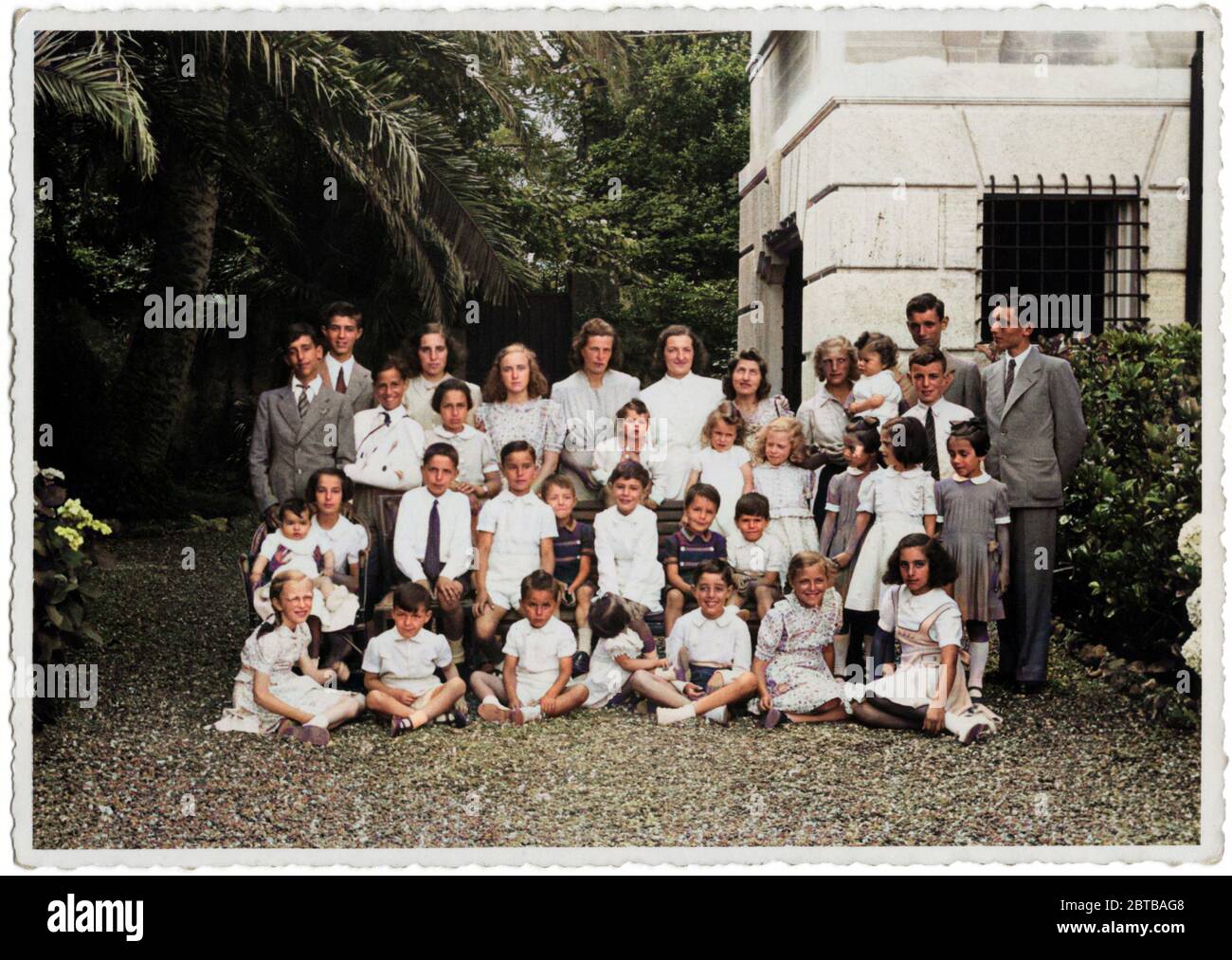 1940 c, GENOVA , ITALY : A brunch of  COSTA family, in this photo reunited all the children of the young generations of the family of shipowners, industrialists of Sampierdarena ( Genova ) and initially producers of olive oil . At the head of this dinasty of his other six brothers was the rich magnate ANGELO COSTA ( 1901 - 1976 ), president of Confindustria on several occasions. Giacomo Costa ( 1836 - 1913) and brother Giovan Battista Costa ( 1825 - 1892 ) founded they founded in 1854 a shipping company which later became the COSTA ARMATORI S.p.a. by Angelo Costa , who became in 1986 COSTA CRO Stock Photo