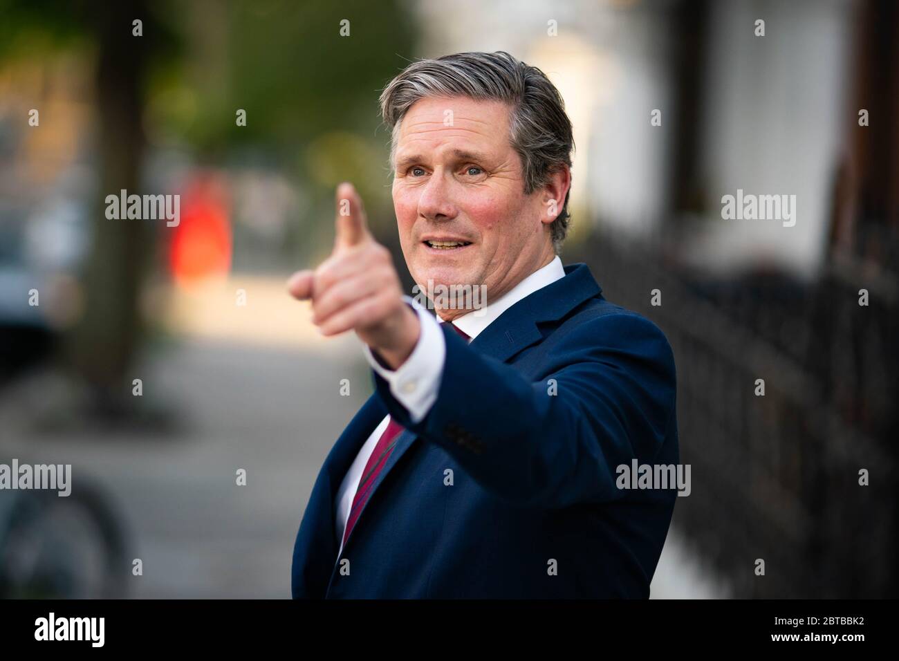 Labour leader Sir Keir Starmer issues a statement outside his home in north London, after Prime Minister Boris Johnson backed his de facto chief-of-staff Dominic Cummings following allegations he breached lockdown restrictions, as Mr Cummings had driven from his London home to Durham in March after his wife started displaying Covid-19 symptoms becoming fearful there would be no-one to look after his four-year-old child if he also took ill. Stock Photo