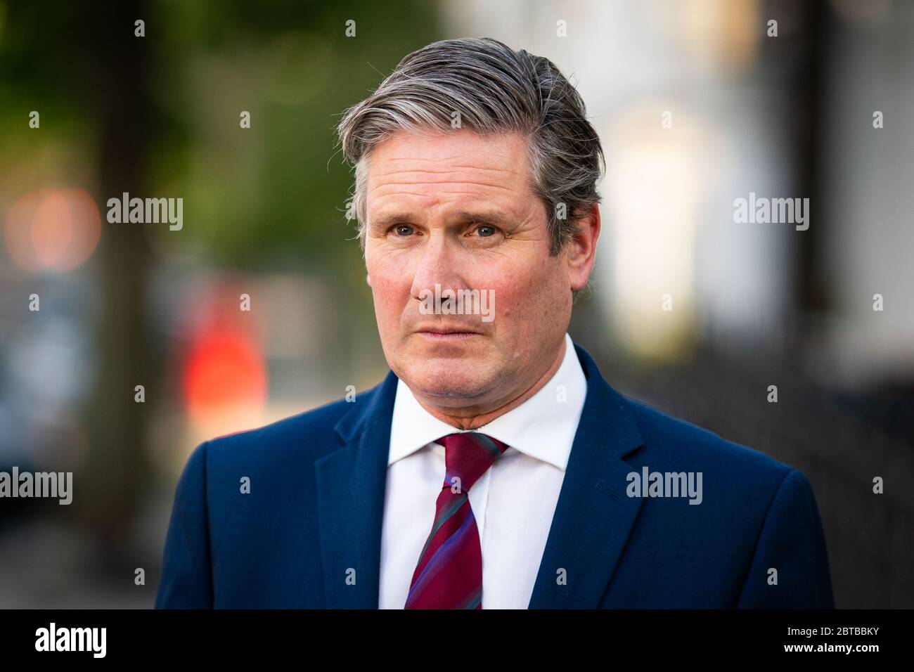 Labour leader Sir Keir Starmer issues a statement outside his home in north London, after Prime Minister Boris Johnson backed his de facto chief-of-staff Dominic Cummings following allegations he breached lockdown restrictions, as Mr Cummings had driven from his London home to Durham in March after his wife started displaying Covid-19 symptoms becoming fearful there would be no-one to look after his four-year-old child if he also took ill. Stock Photo