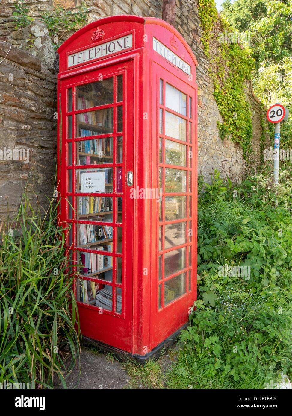 K7 Telephone box used as a library in a Somerset village UK Stock Photo