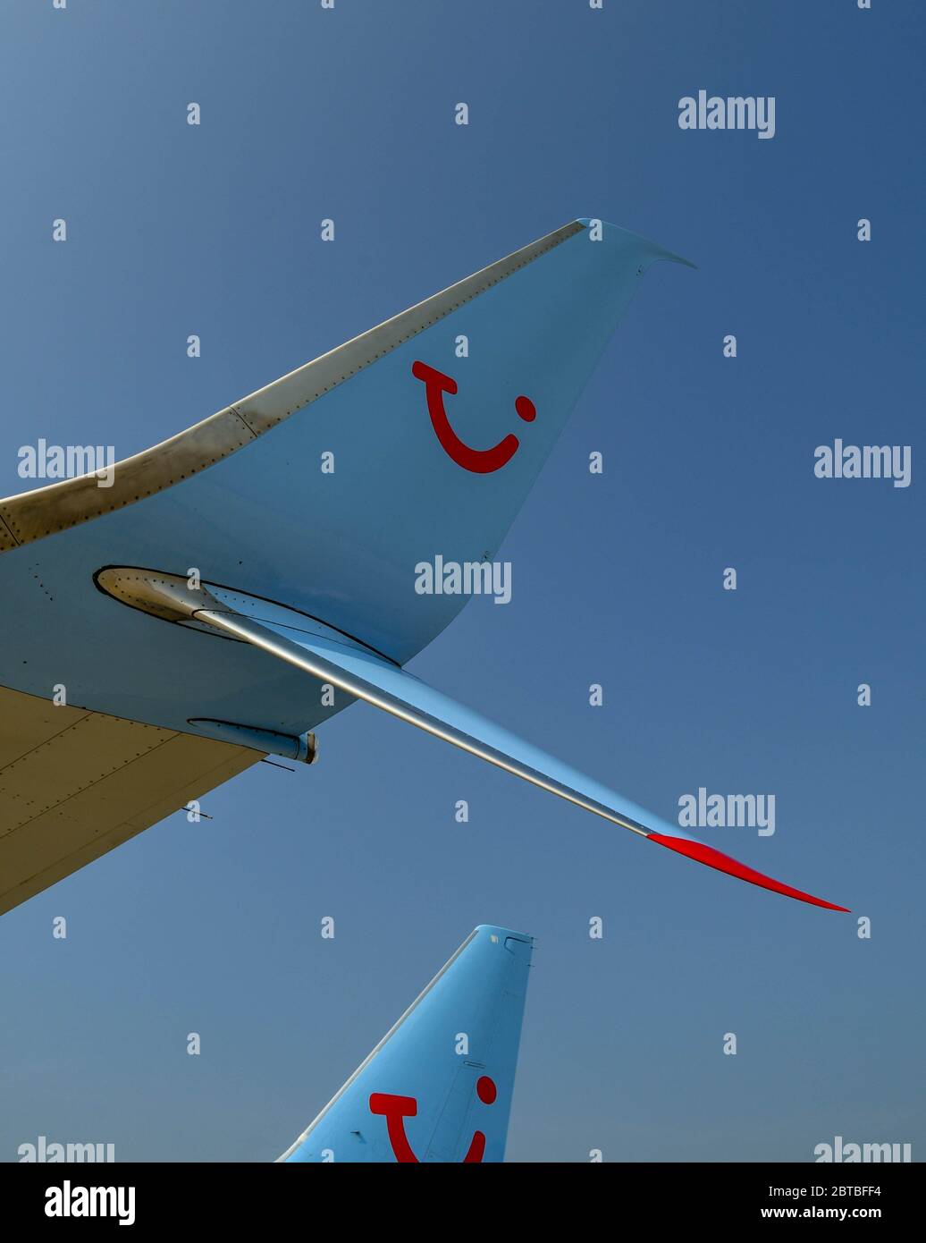 Curved wing tip of a TUI holiday jet Stock Photo