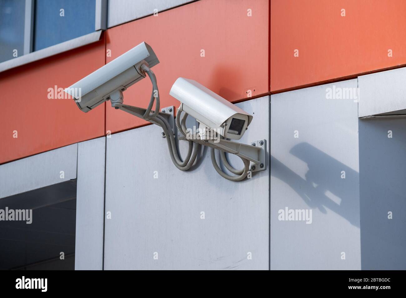 CCTV outdoor camera on a wall Stock Photo