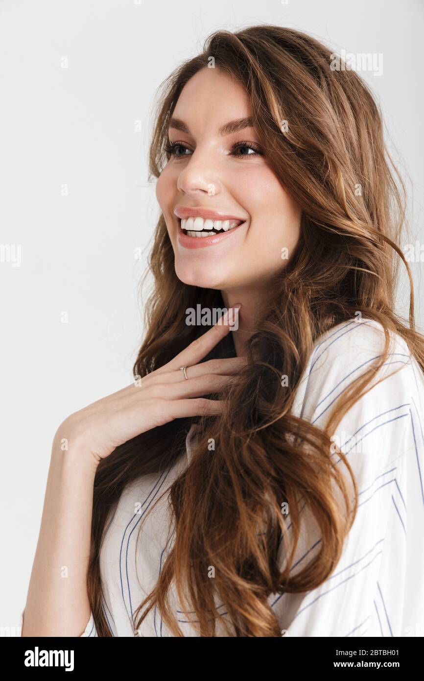 Image of joyful caucasian woman posing and laughing at camera isolated ...
