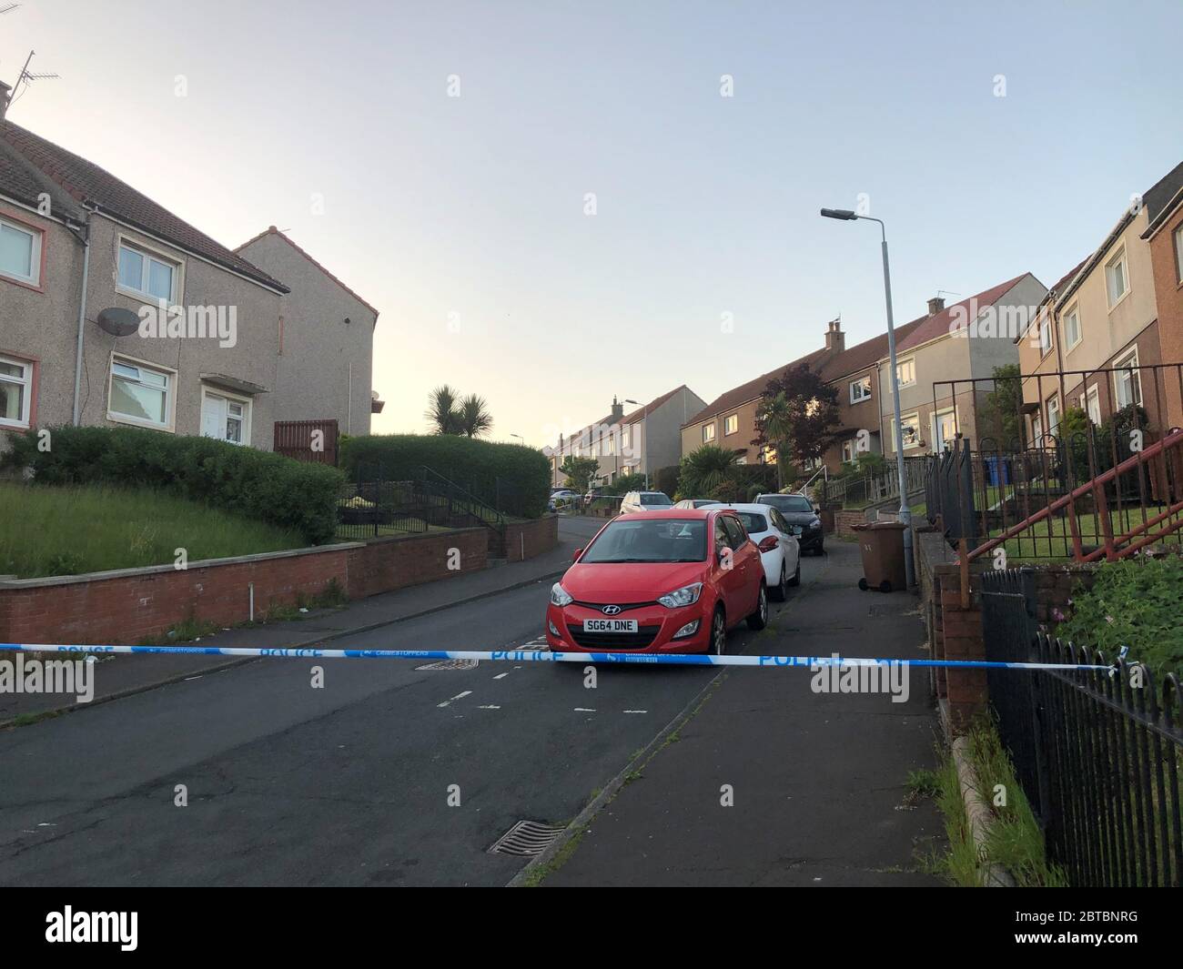 Police at the scene of a shooting in Nithsdale Road, Ardrossan in North Ayrshire, where a 42-year-old man has died following a shooting. Police Scotland said a search is ongoing in Ardrossan for the suspect. Stock Photo