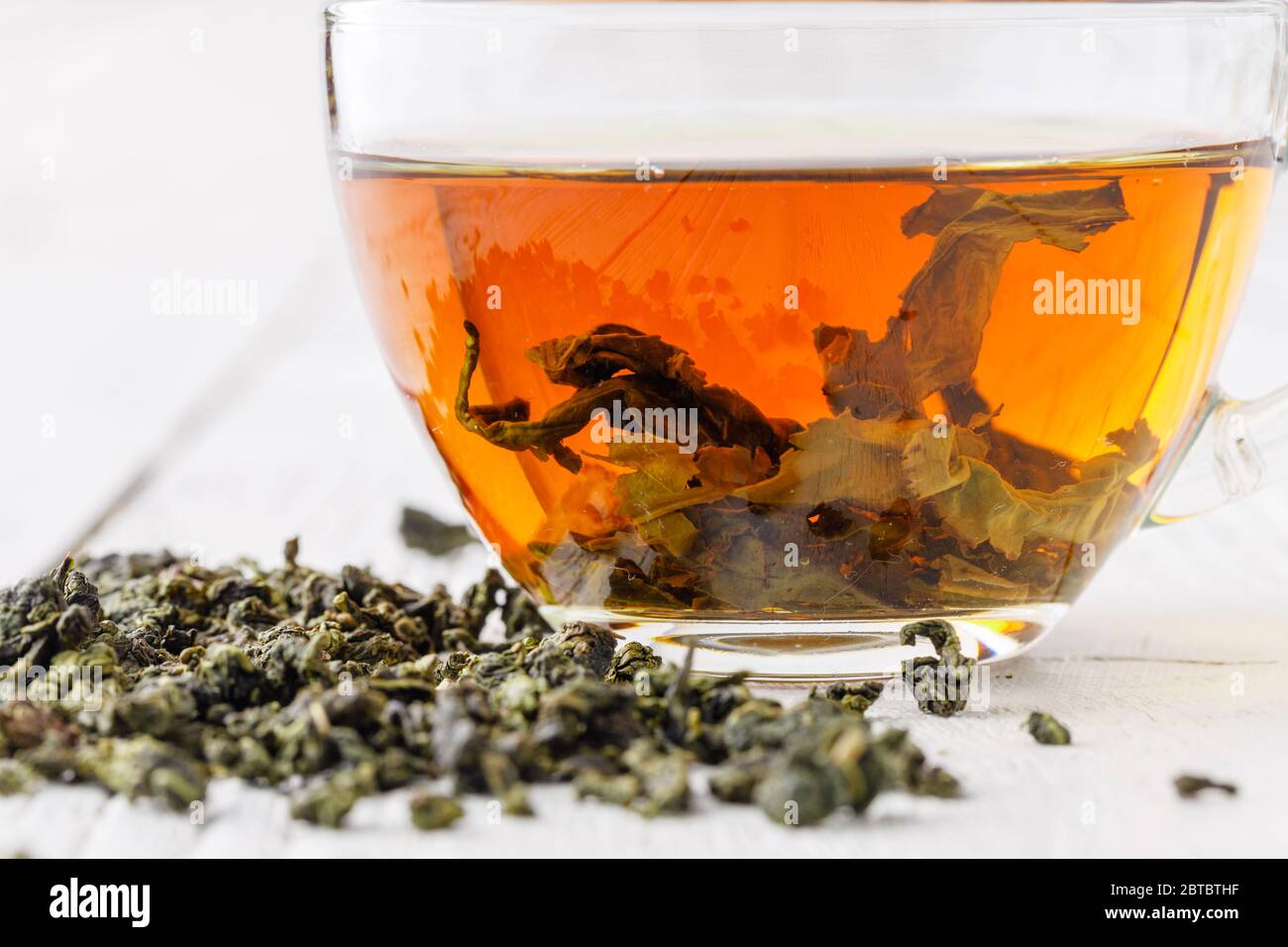 Traditional green Chinese tea. Tea on a white background. Tiguanin