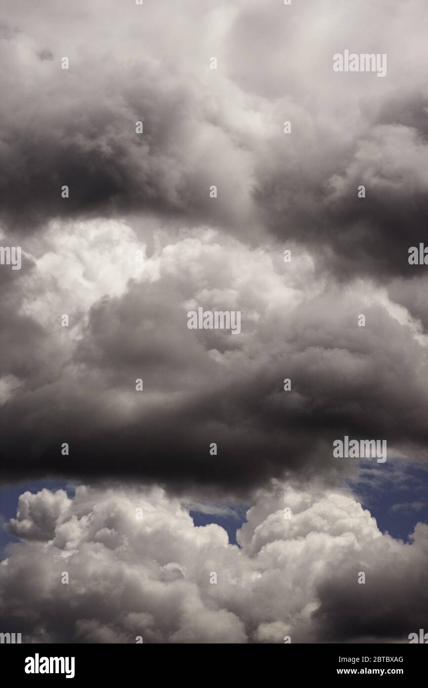 Fluffy grey clouds hi-res stock photography and images - Alamy