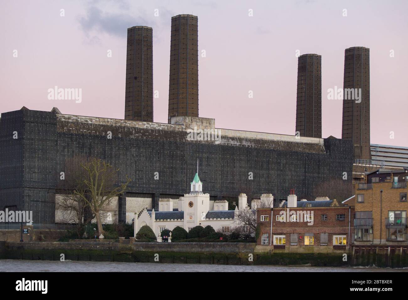 Greenwich power station and Trinity Hospital almshouses Sheltered housing Stock Photo