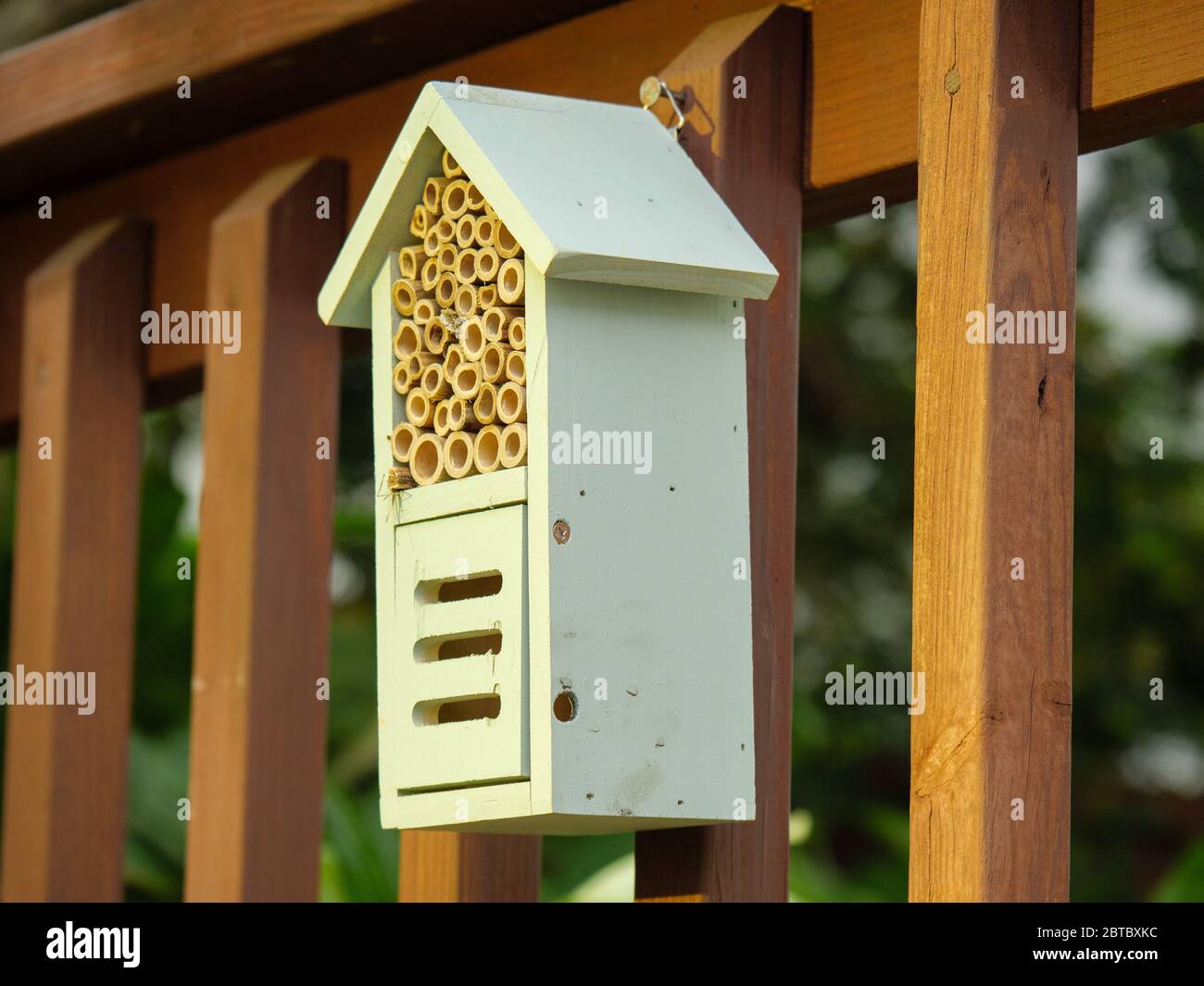 Bee and pollinator house. Provides nesting cavities for solitary bees and hiding place for polllinators. Stock Photo