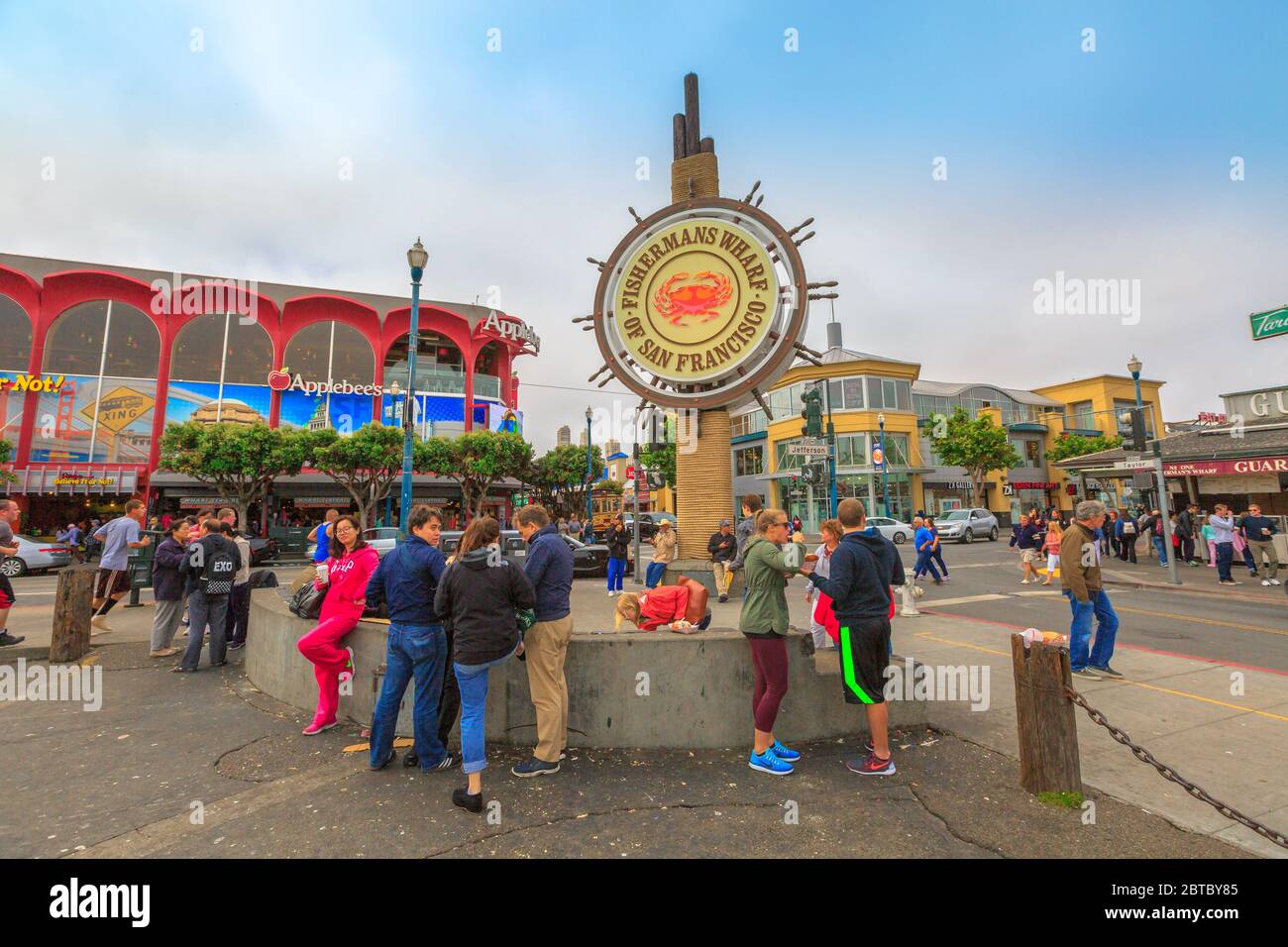 San Francisco, California, United States - August 14, 2016: tourists at Fisherman's Wharf of San Francisco on Jefferson road. The Fisherman's Wharf is Stock Photo