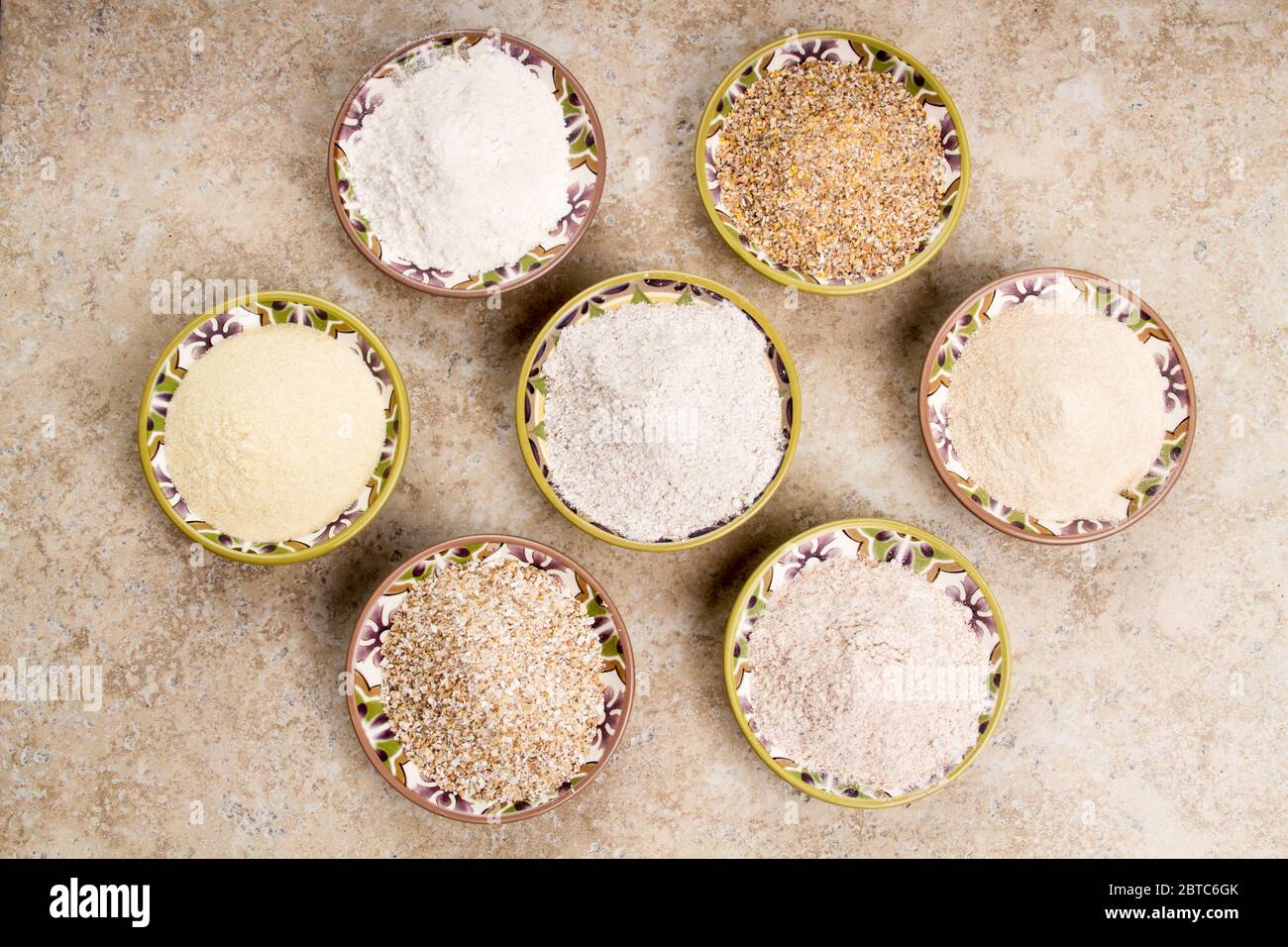 Various kinds of flour and grains. From back left, clockwise bread