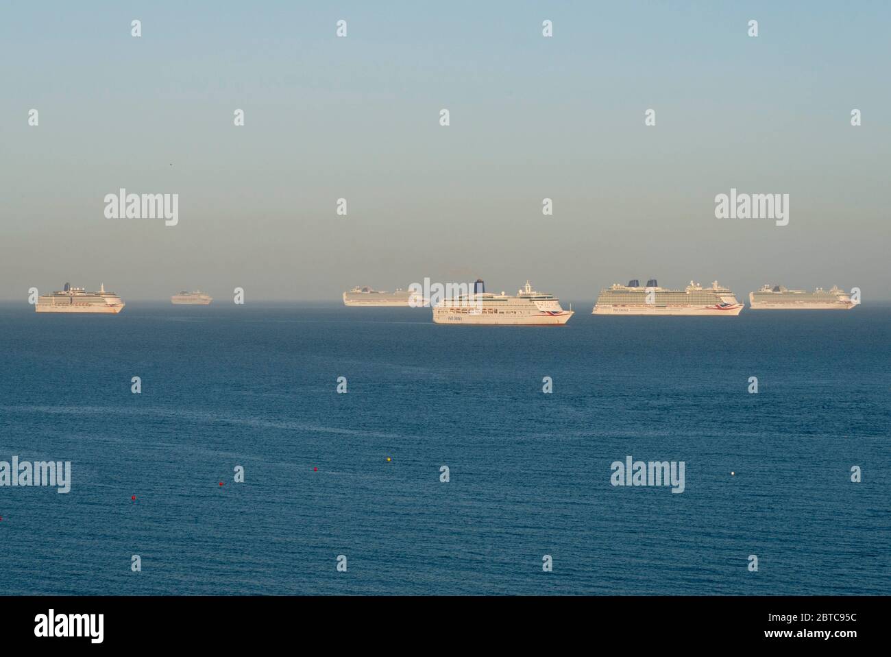 Weymouth Dorset Uk 24th May 2020 Six Of The Seven Empty Cruise Ships Which Are Now Anchored Off The Coast Of Weymouth In Dorset During The Cruising Shutdown Because Of The Coronavirus