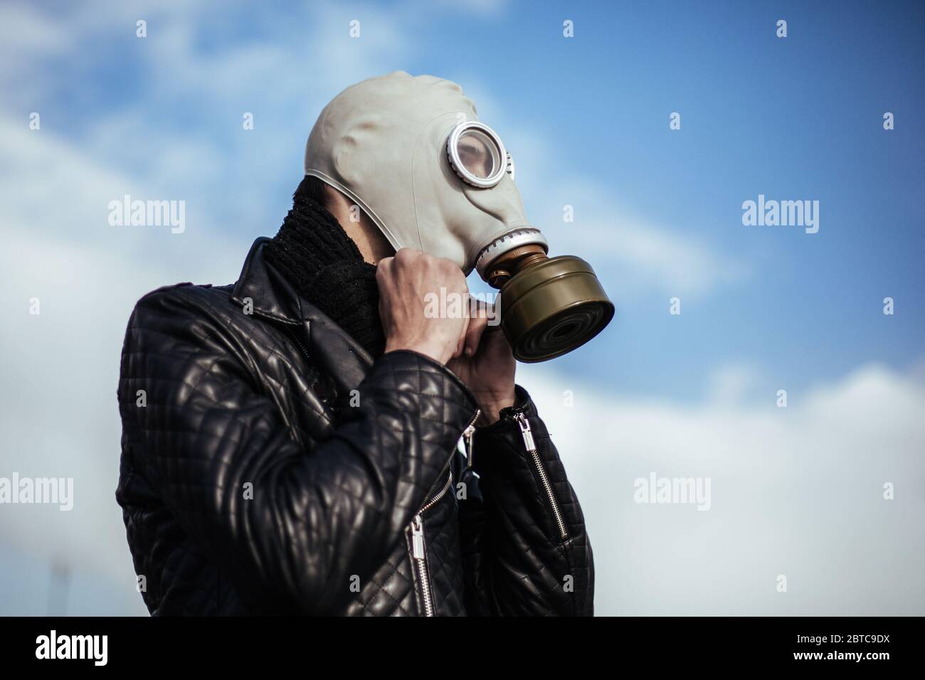 close up. casual guy in a gas mask Stock Photo - Alamy