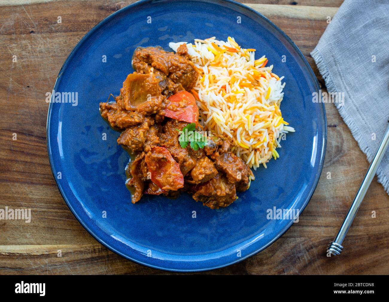 Chicken tikka masala with saffron rice, flat lay Stock Photo