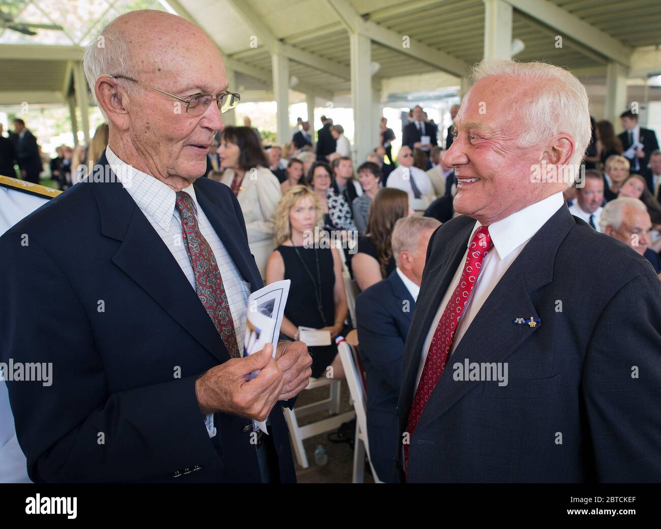 Apollo 11 Astronauts Michael Collins, left, and Buzz Aldrin talk at a private memorial service celebrating the life of Neil Armstrong, Aug. 31, 2012, at the Camargo Club in Cincinnati.  (NASA/Bill Ingalls) Stock Photo