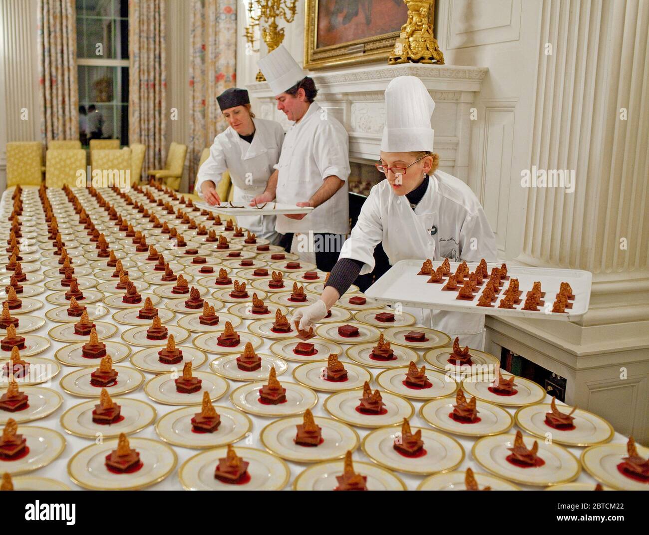 Dessert plates are prepared by Assistant Pastry Chef Susie Morrison in