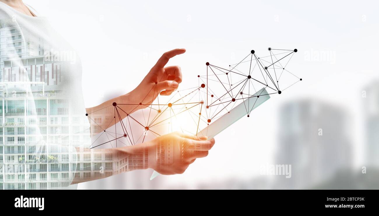 Businesswoman works with futuristic interface Stock Photo
