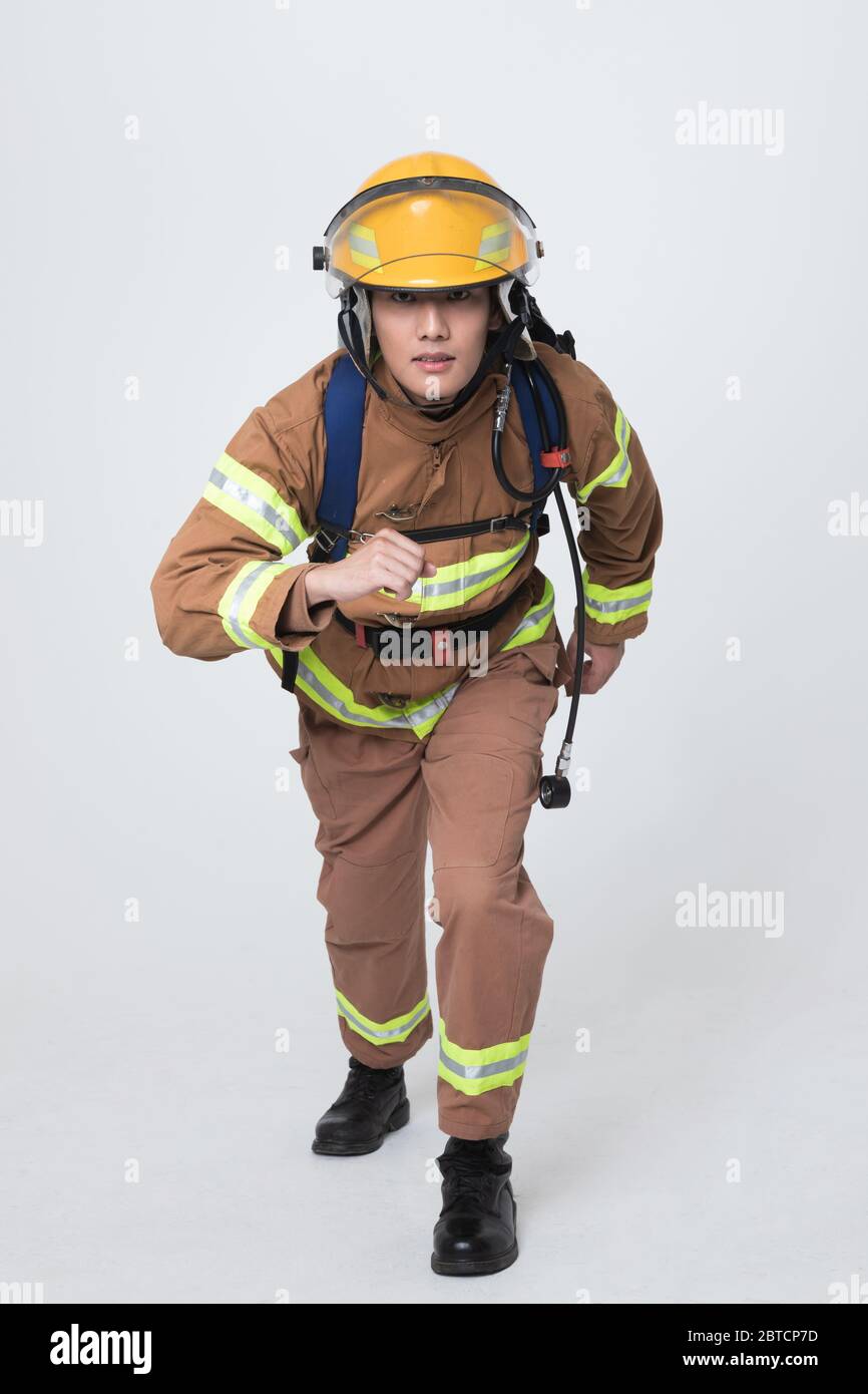 Asian male and female firefighter portrait, young smiling fireman in