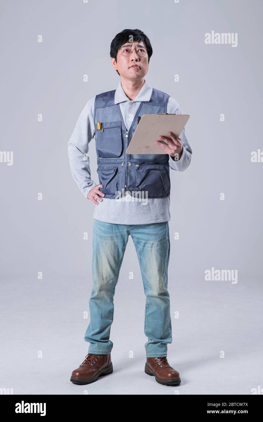 A Studio Portrait Of Asian Man Making A Confident Smile 428 Stock Photo Alamy A Studio Portrait Of Asian Man Making A Confident Smile 428 Stock Photo Alamy