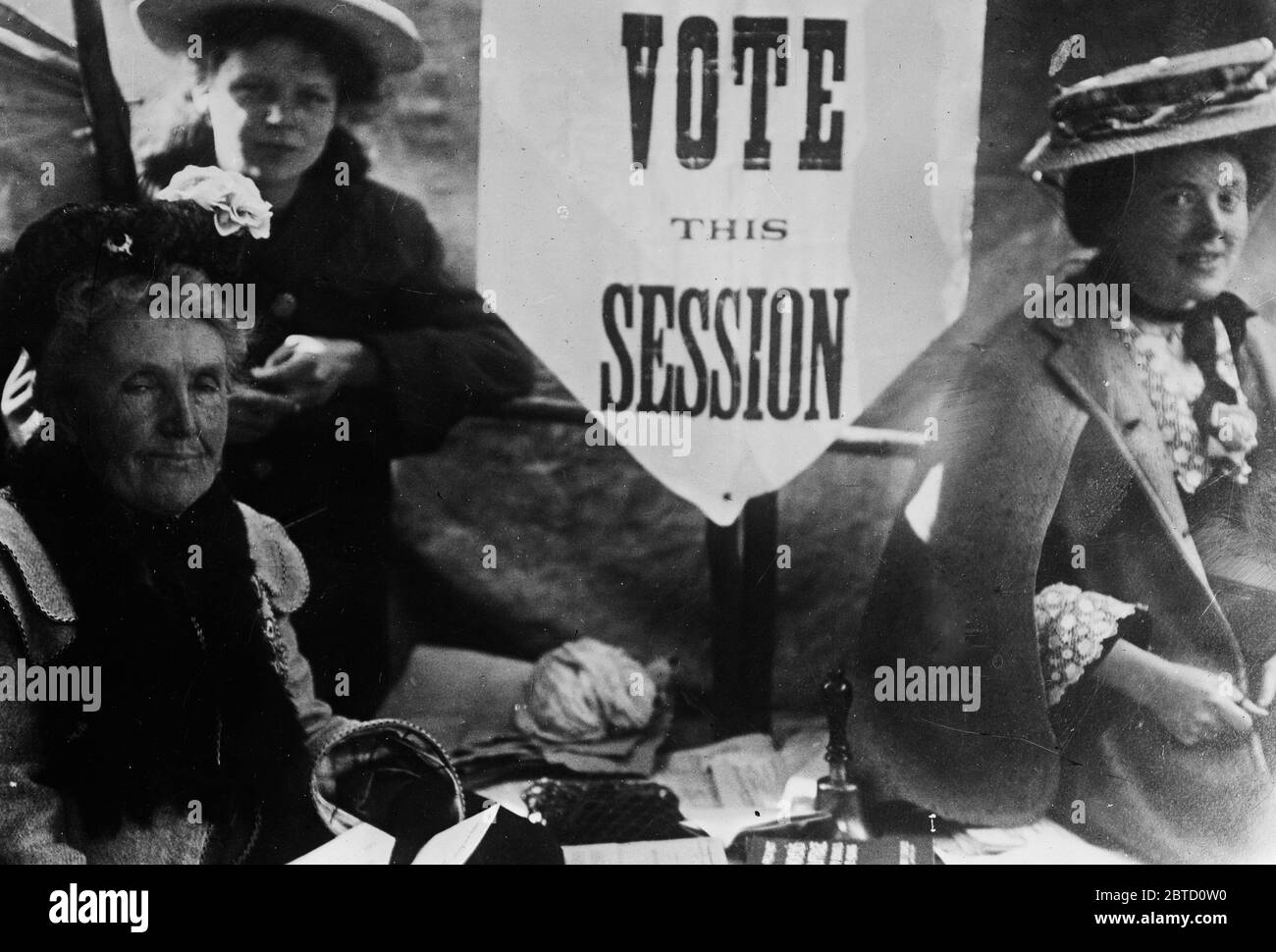 Women with voting poster ca. 1910s Stock Photo