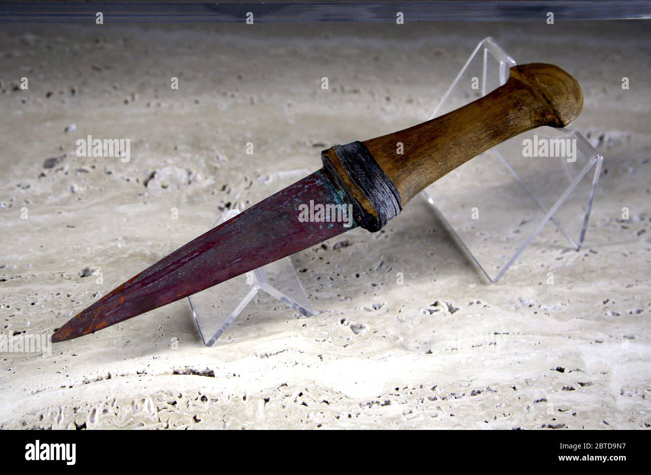 Copper dagger with handle, 4th cent BC.(reproduction) Eneolithic culture. Gaudo necropolis, Southern Italy. Archaeological Museum of Paestum Stock Photo