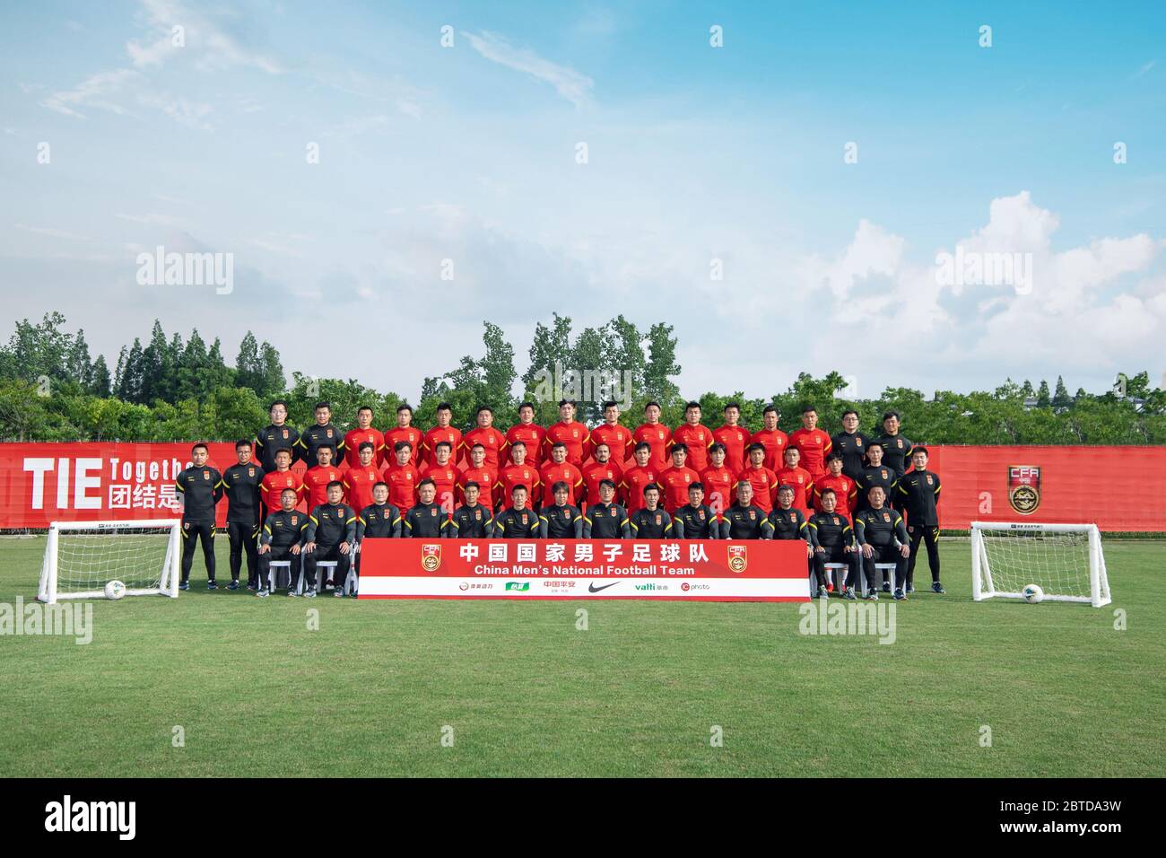 The group photo of China national football team while they train in Shanghai, China, 18 May 2020. Back row: Huang Weitao, Zhang Lin, Li Lei, Yang Fan, Tan Long, Cai Huikang, Wang Dalei, Yan Junling, Liu Dianzuo, Yang Xu, Dong Xuesheng, Li Ang, Zhang Linpeng, Yu Dabao, Sui Han, Chen Xi Middle row: Kang Kebao, Zhang Tengfei, Chi Guozhong, Li Ke, Wei Shihao, Zhang Xizhe, Jiang Zhipeng, Liu Binbin, Wuxi, Ai Kesen, Luo Guofu, Wang Sangchao, Song Junmin, Ming Tian, Liu Yun, Tang Miao, Jin Jingdao, Du Lida, Zhang Yanrui Front row: Huang Zhuping, Hu Zhuowei, Chen Xiangning, Xin Feng, Xue Shen, Zheng B Stock Photo