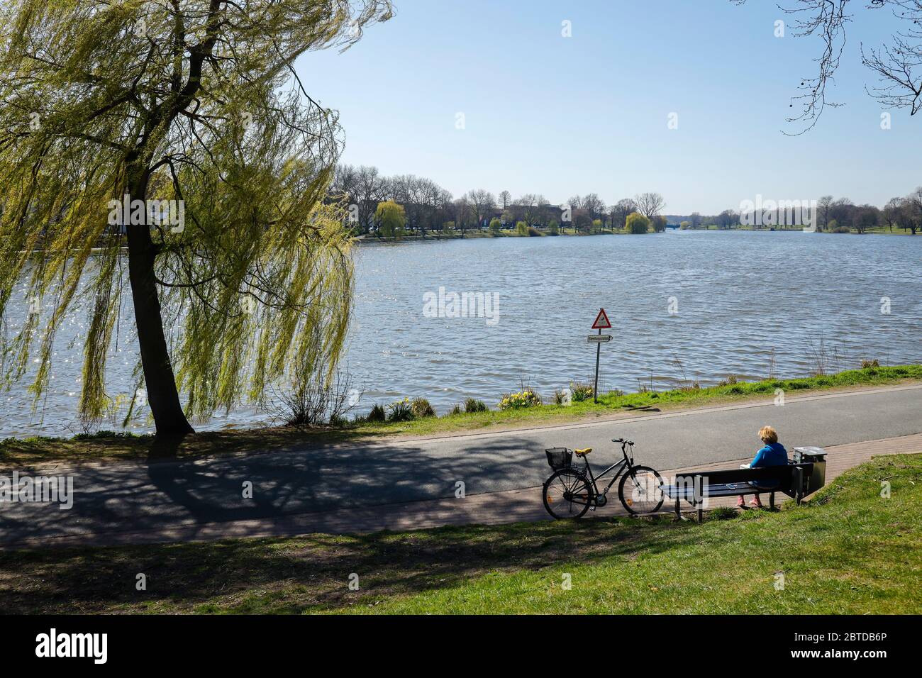 Muenster, North Rhine-Westphalia, Germany - Leisure time at Lake Aa during the corona crisis in compliance with the ban on contact. Muenster, Nordrhei Stock Photo