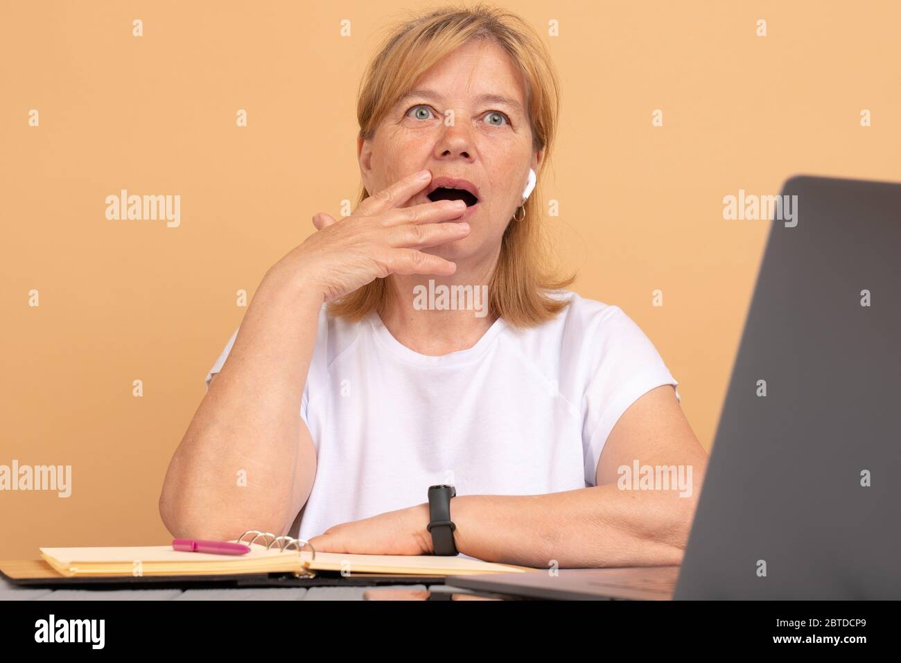 Stressed frustrated senior woman student reading bad email internet news feeling sad tired of study work online, upset about problem, failed exam test Stock Photo