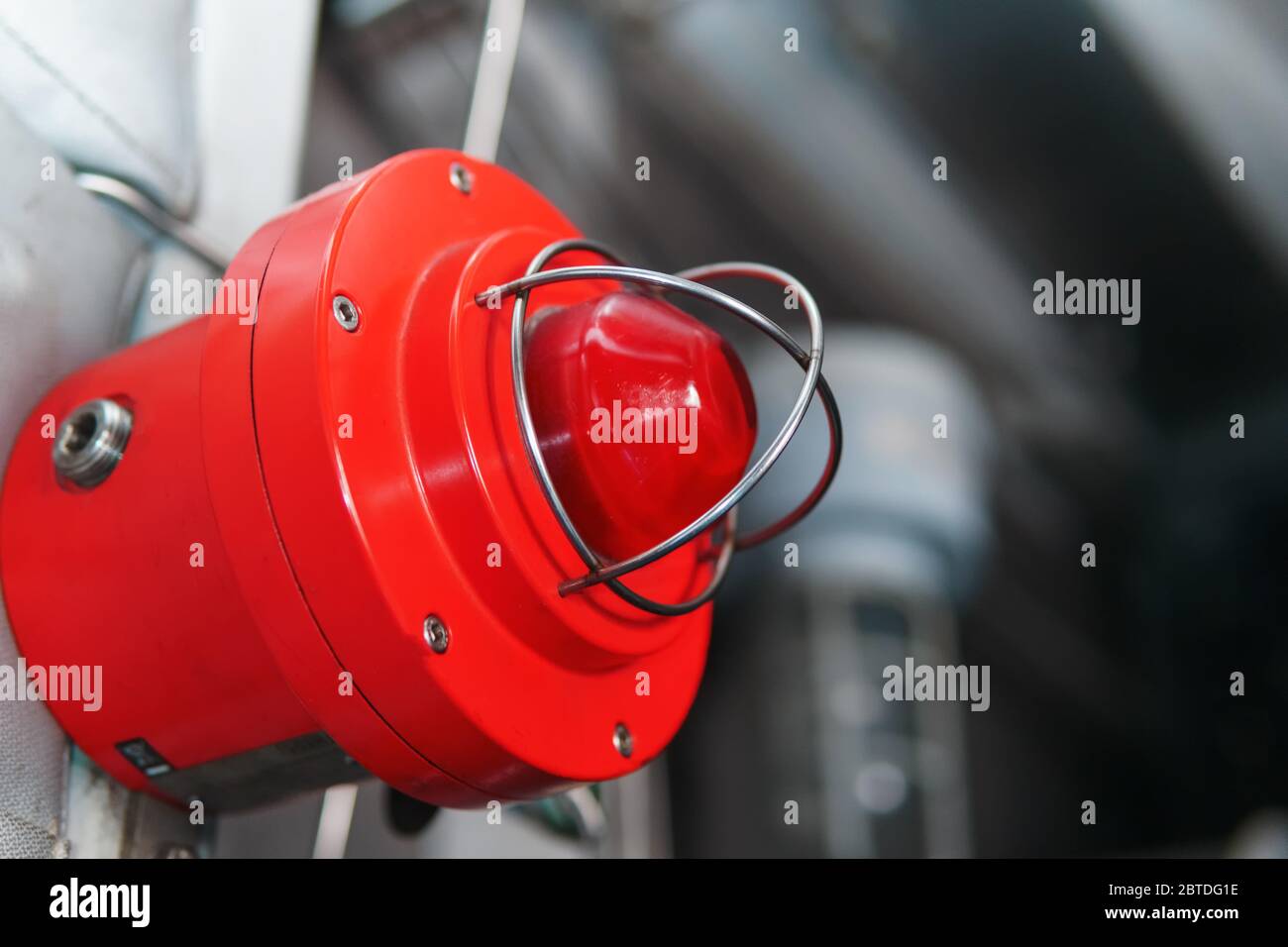 Red warning light of a fire system at an industrial facility. Light