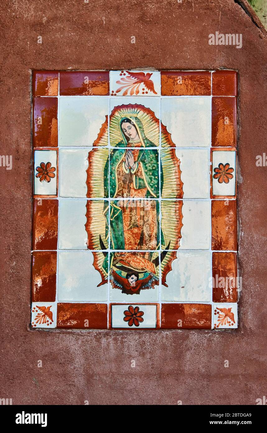 Virgin of Guadalupe tile mosaic at El Convento Bed and Breakfast, former convent, in San Luis, Colorado, USA Stock Photo