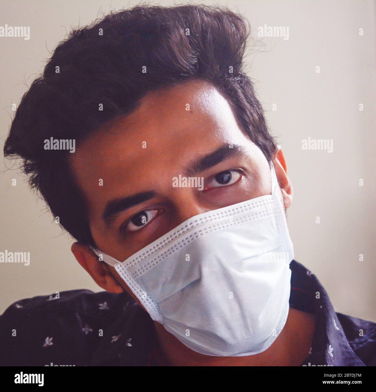 Man giving pose with face mask hi-res stock photography and images - Alamy