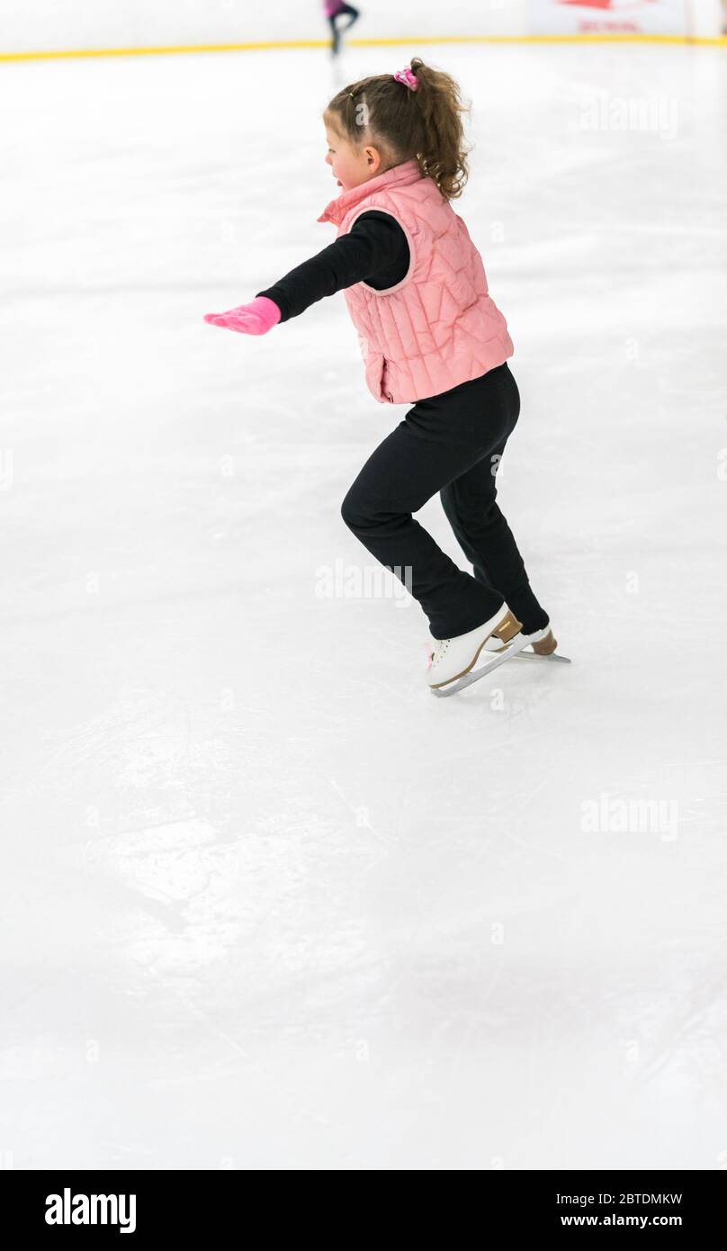 Little girl on sale ice skating