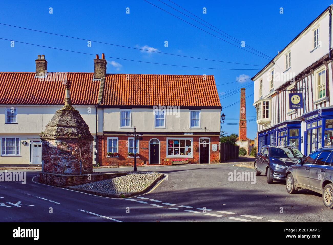 The Pump at Common Place, Little Walsingham, Norfolk, UK. The old village pump house for drawing