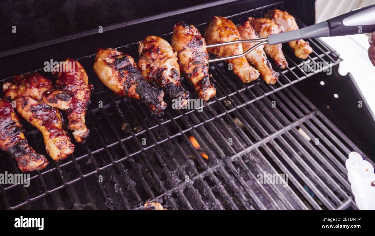 Grilling Bbq Chicken On Outdoor Gas Grill Stock Photo Alamy