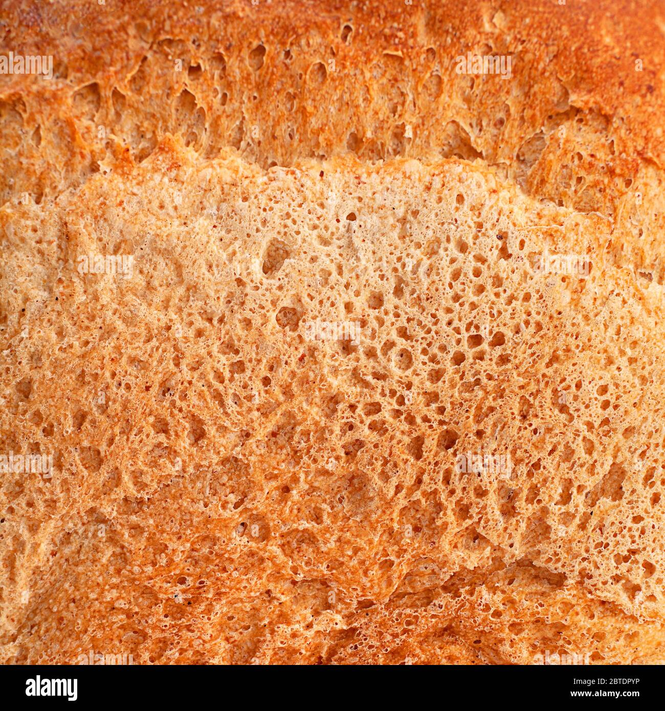 Square bread loaf closeup background Stock Photo