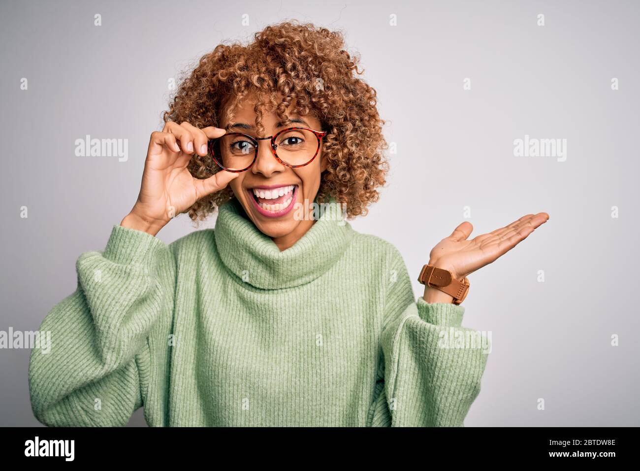 African american optical woman with curly hair wearing glasses over ...