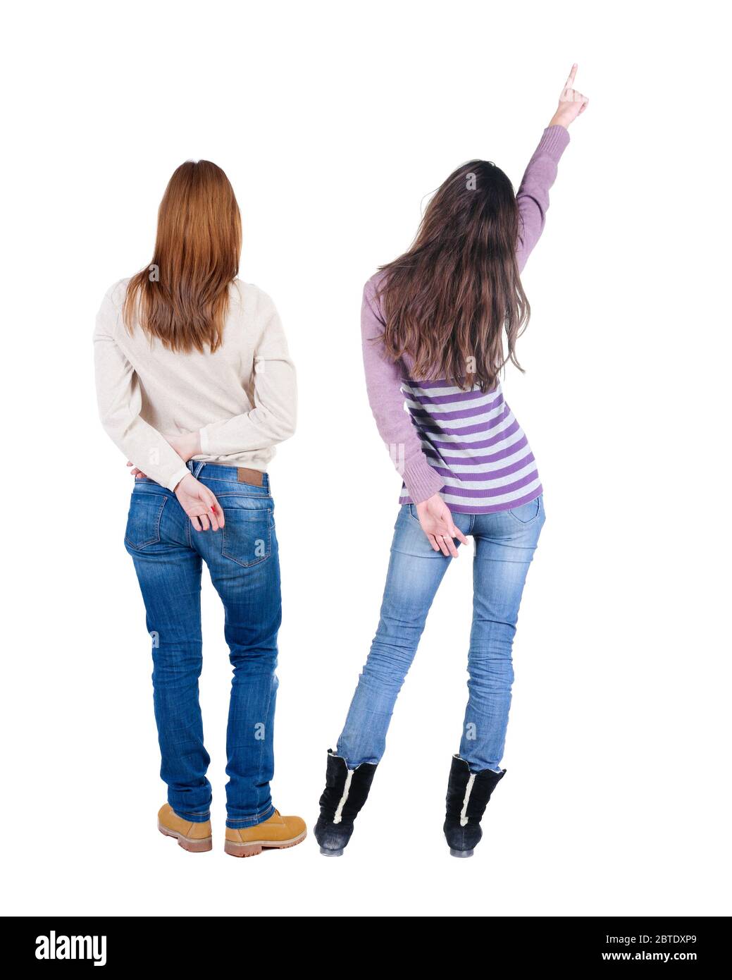 First Back View Back view of two young woman photographed on a mobile phone in sweater ...
