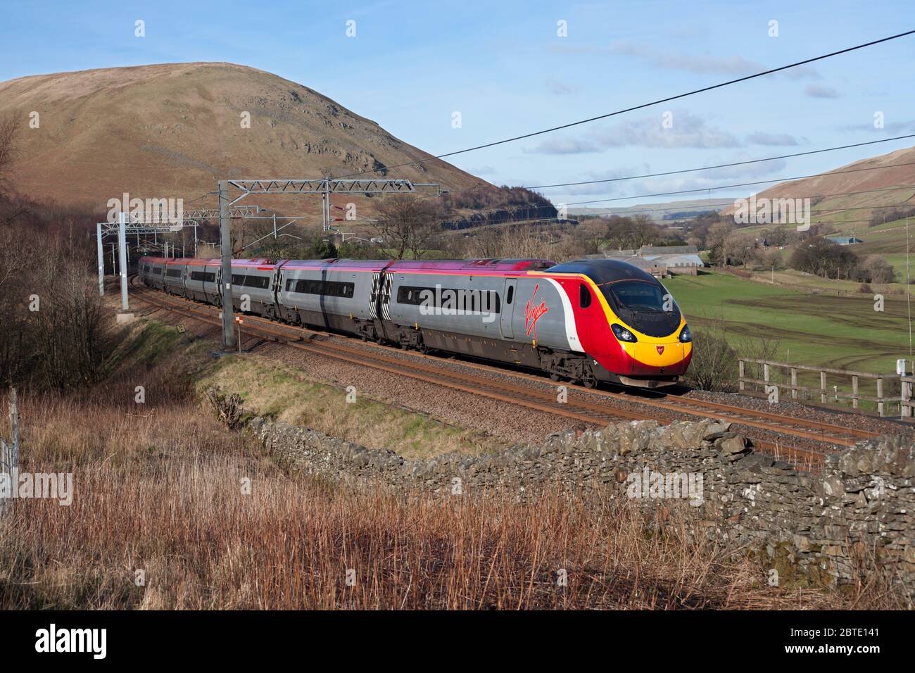 Virgin Trains west coast Pendolino train passing through the Lune