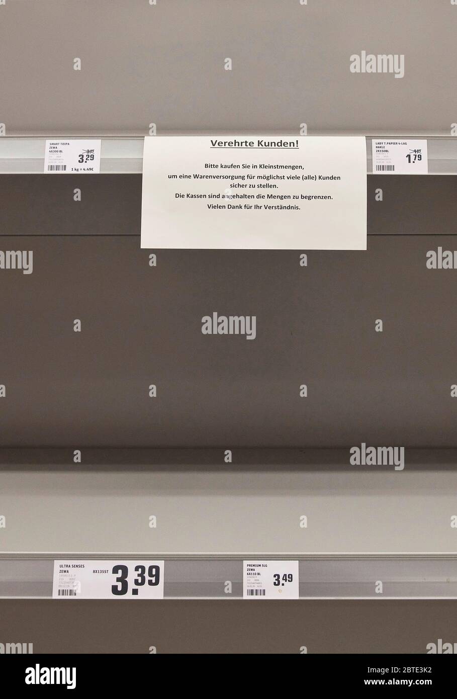 empty rack in a supermarket while panic buying at corona crisis, Germany, North Rhine-Westphalia Stock Photo