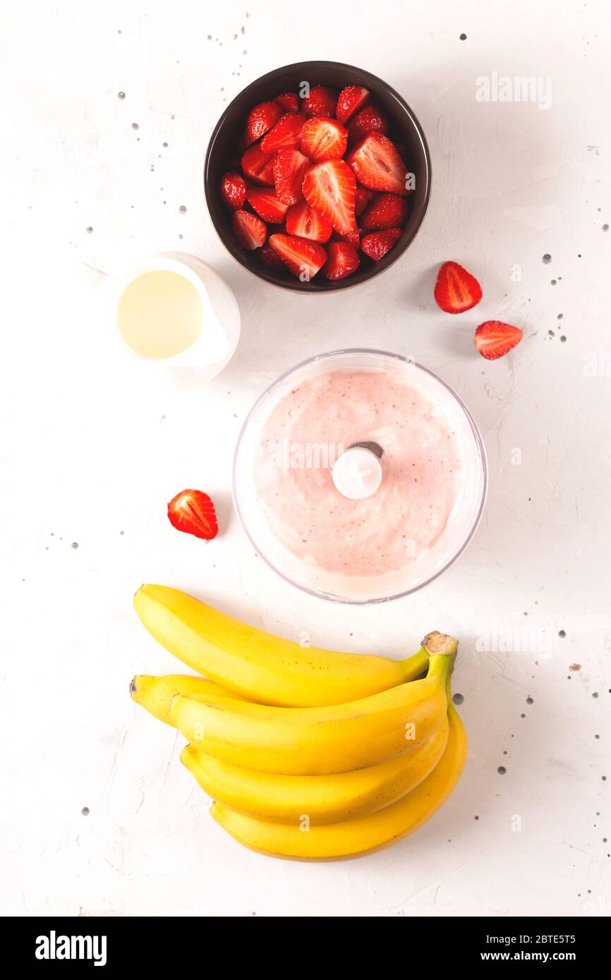 Healthy banana, strawberry and milk smoothie blender breakfast Stock ...